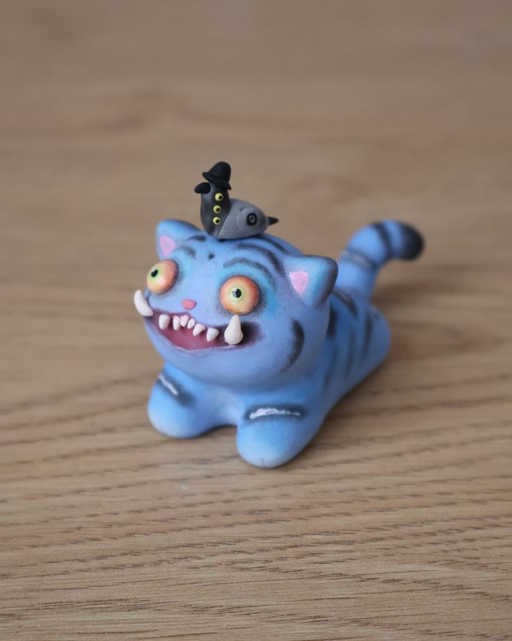 Lumo — a small handcrafted clay monster character from Jugnu